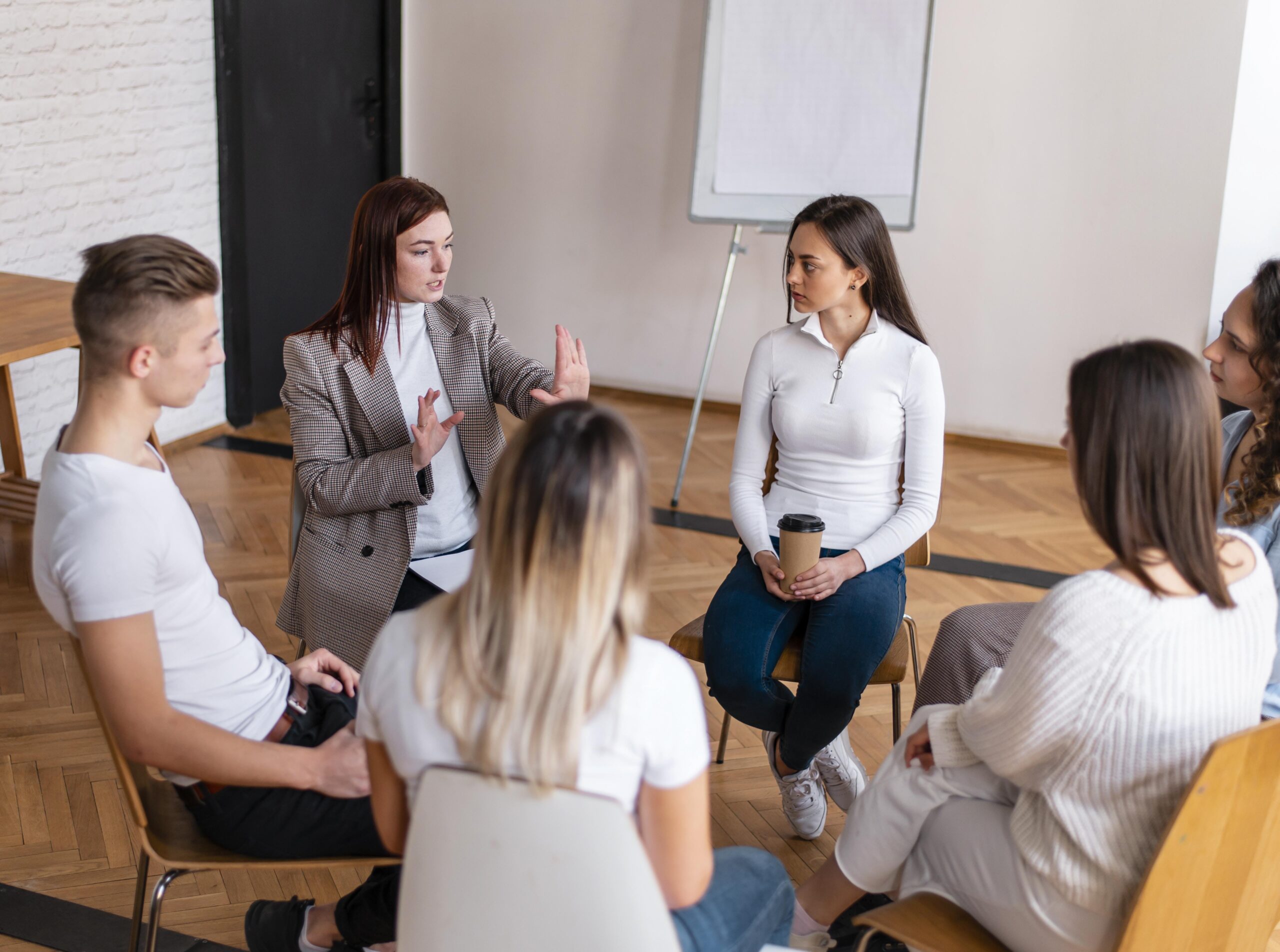 People sitting in a circle during a workshop